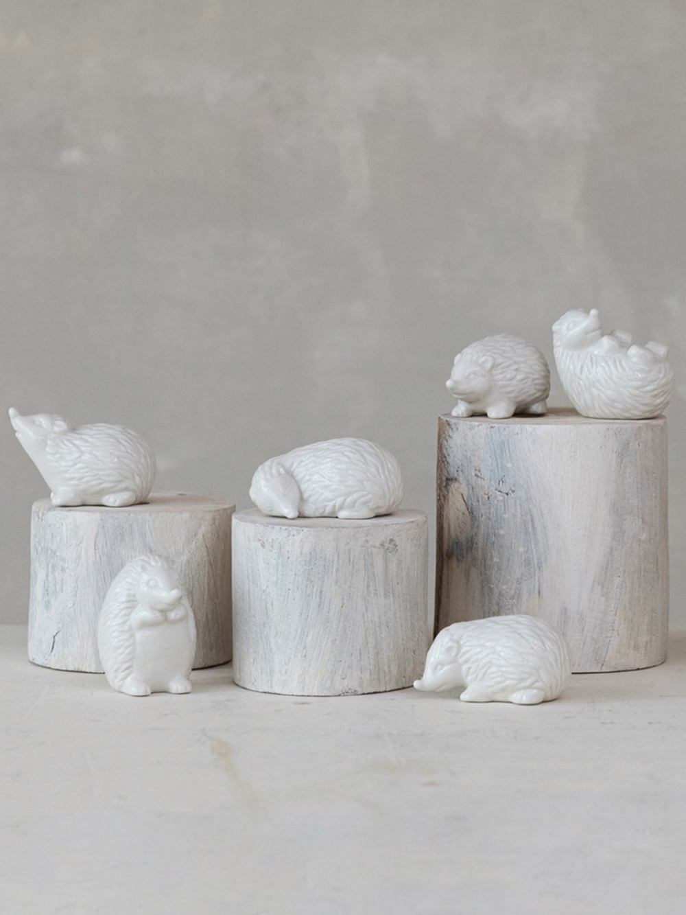 Set of Six White Ceramic Hedgehog Figurines